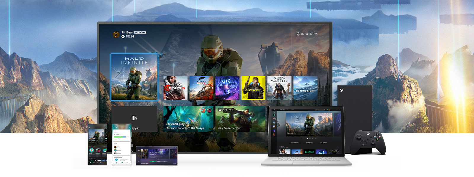 The Xbox dashboard is displayed on a TV next to an Xbox Series X. Additional devices such as a PC and mobile devices sit in front of the TV.
