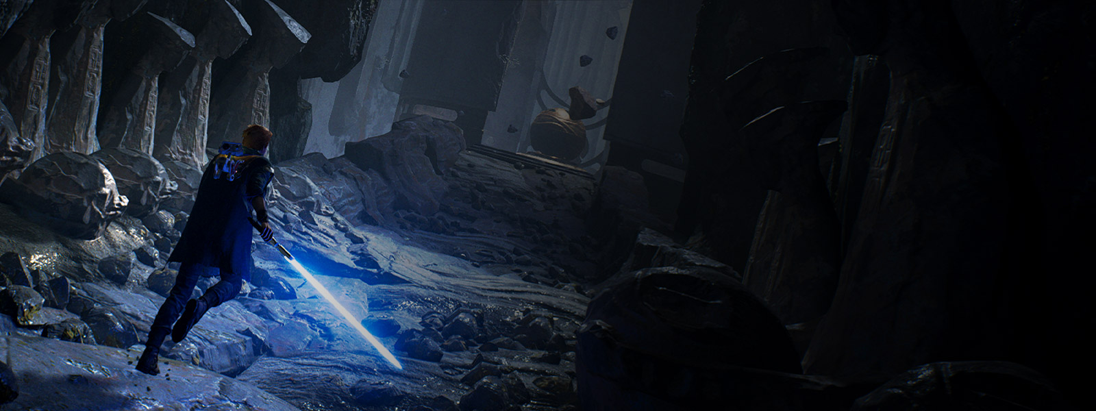 Кал Кестис готовит свой световой меч, проходя по коридору в каких-то руинах