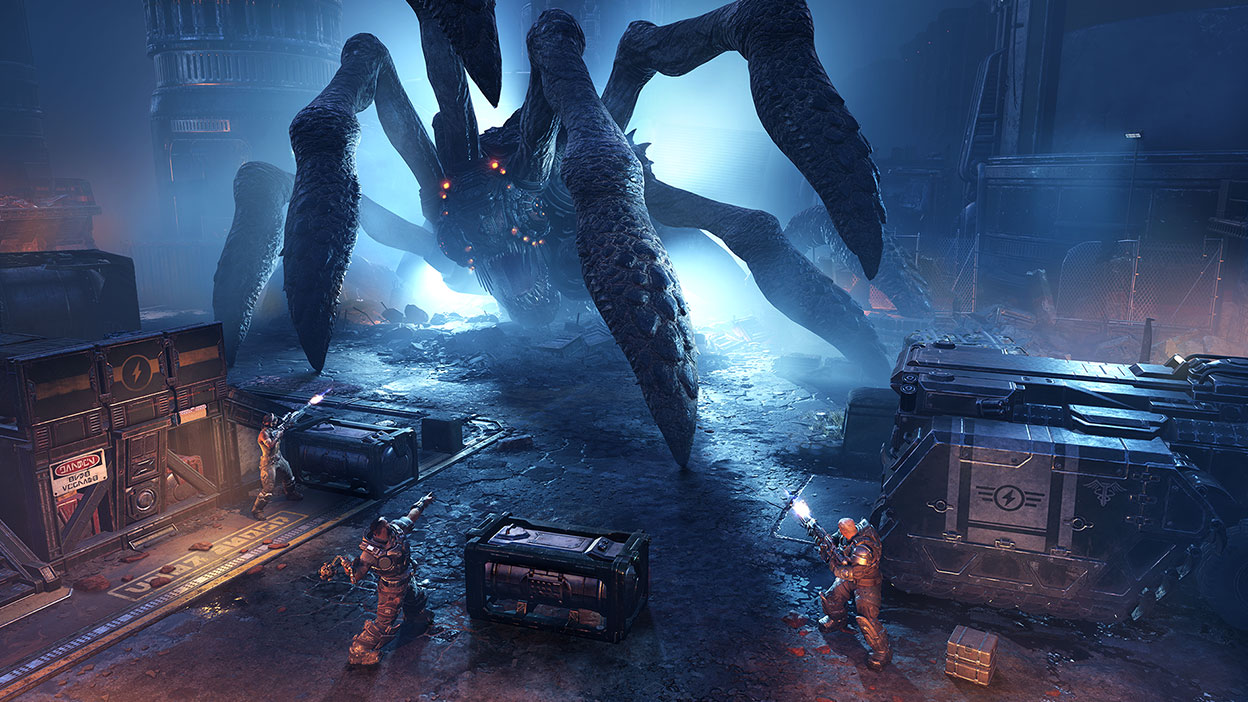 Three characters fighting a large spider-like monster