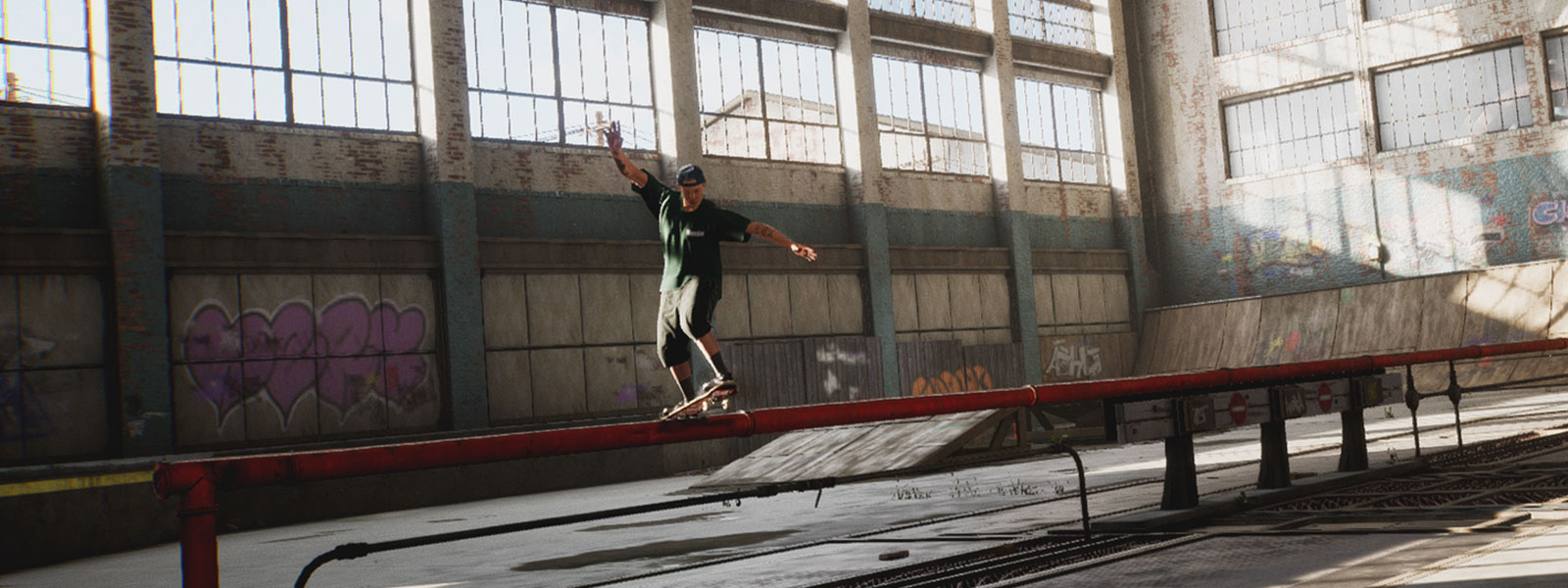 A skateboarder carefully grinds across a rail. 