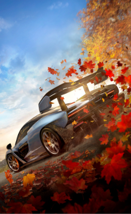 Forza Horizon 4, un auto McLaren corre por unas hojas