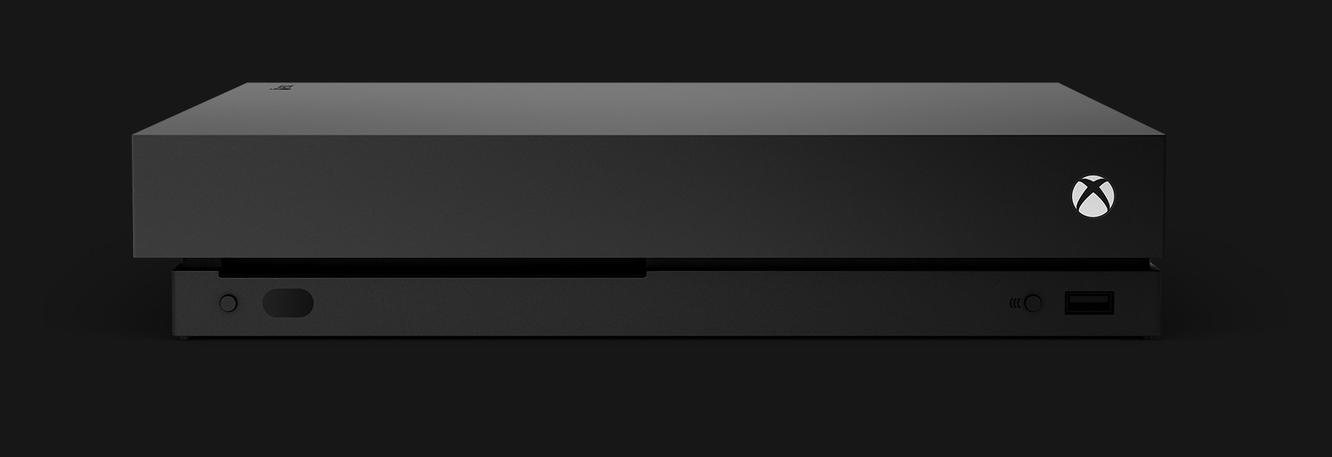 The front view of an Xbox One X console.