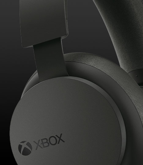 Xbox ステレオ ヘッドセットの右側イヤーカップの音量ダイアルのクローズ アップ